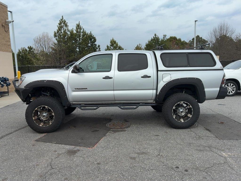 Toyota Tacoma 4WD Double Cab V6 MT (Natl) 2013