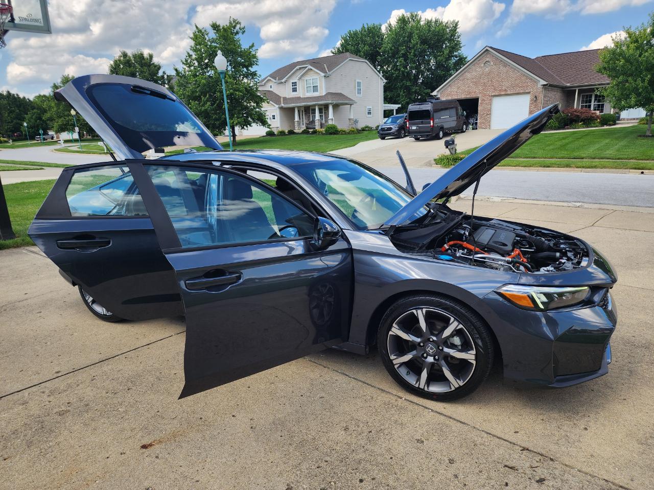 Honda Civic Hatchback Hybrid Sport Touring CVT 2025