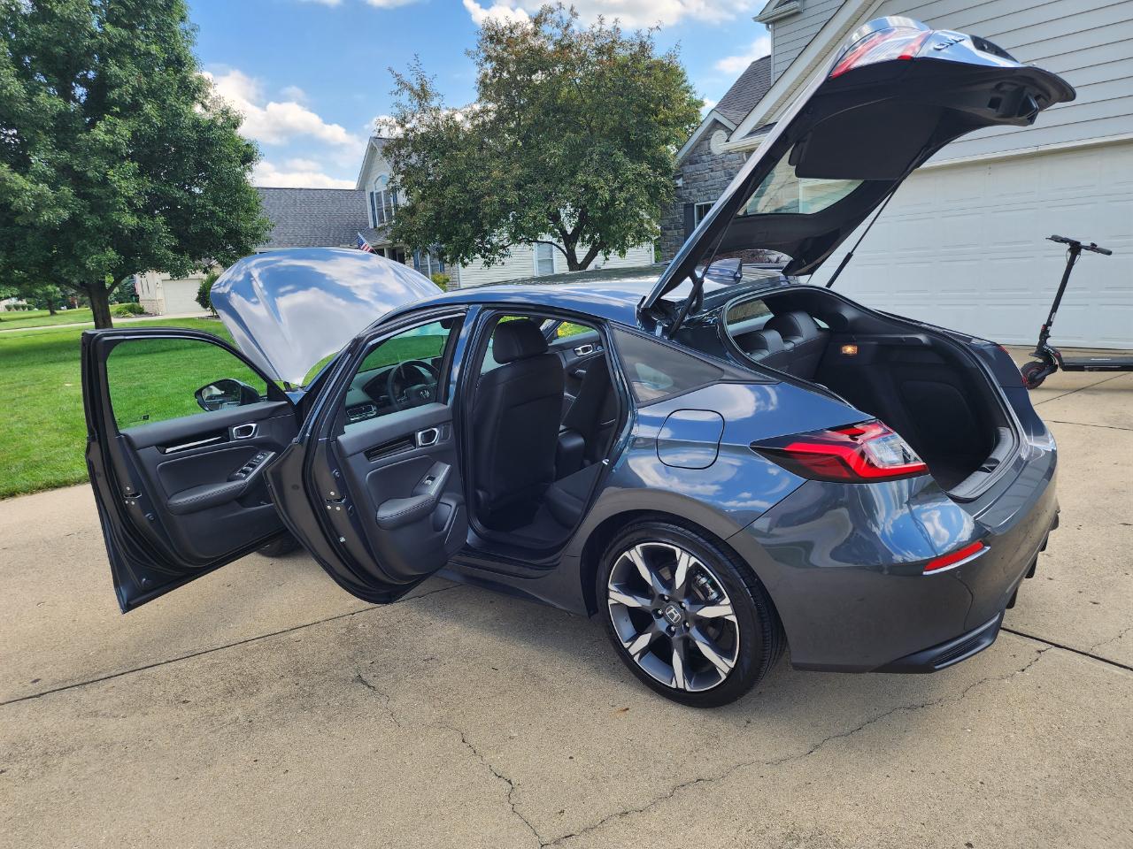 Honda Civic Hatchback Hybrid Sport Touring CVT 2025