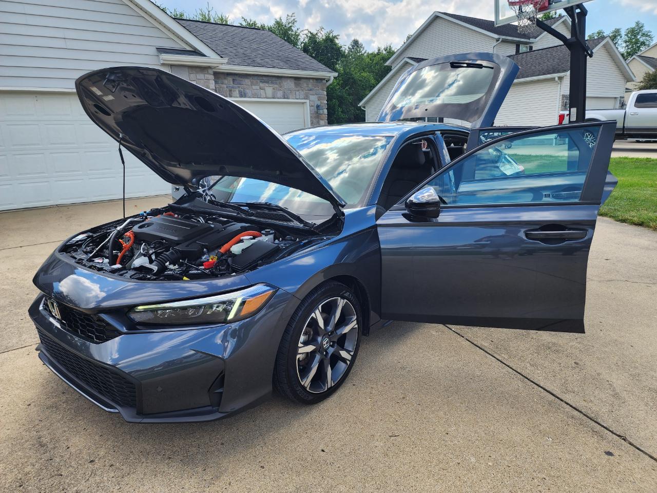 Honda Civic Hatchback Hybrid Sport Touring CVT 2025