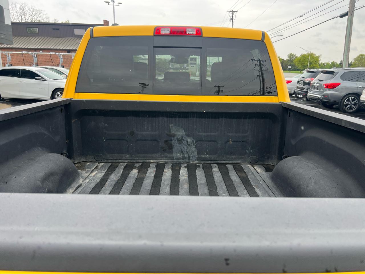 RAM 1500 4WD Crew Cab 140.5" Sport 2016