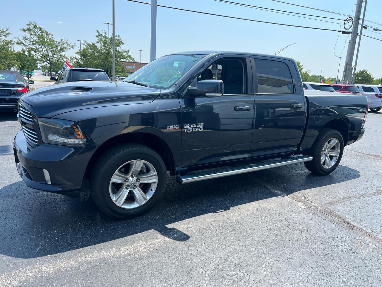 RAM 1500 4WD Crew Cab 140.5" Sport 2015