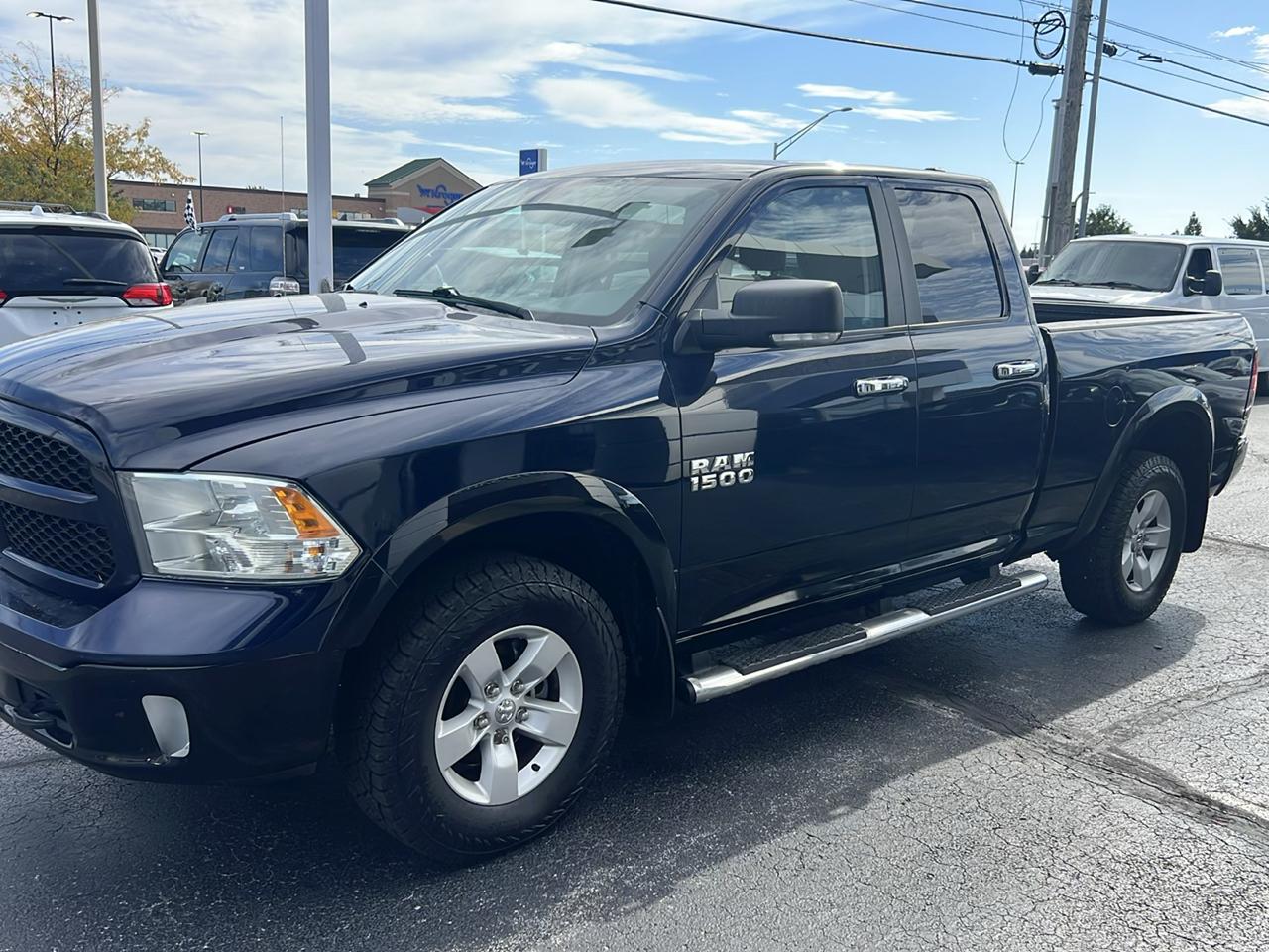 RAM 1500 4WD Quad Cab 140.5" Outdoorsman 2014