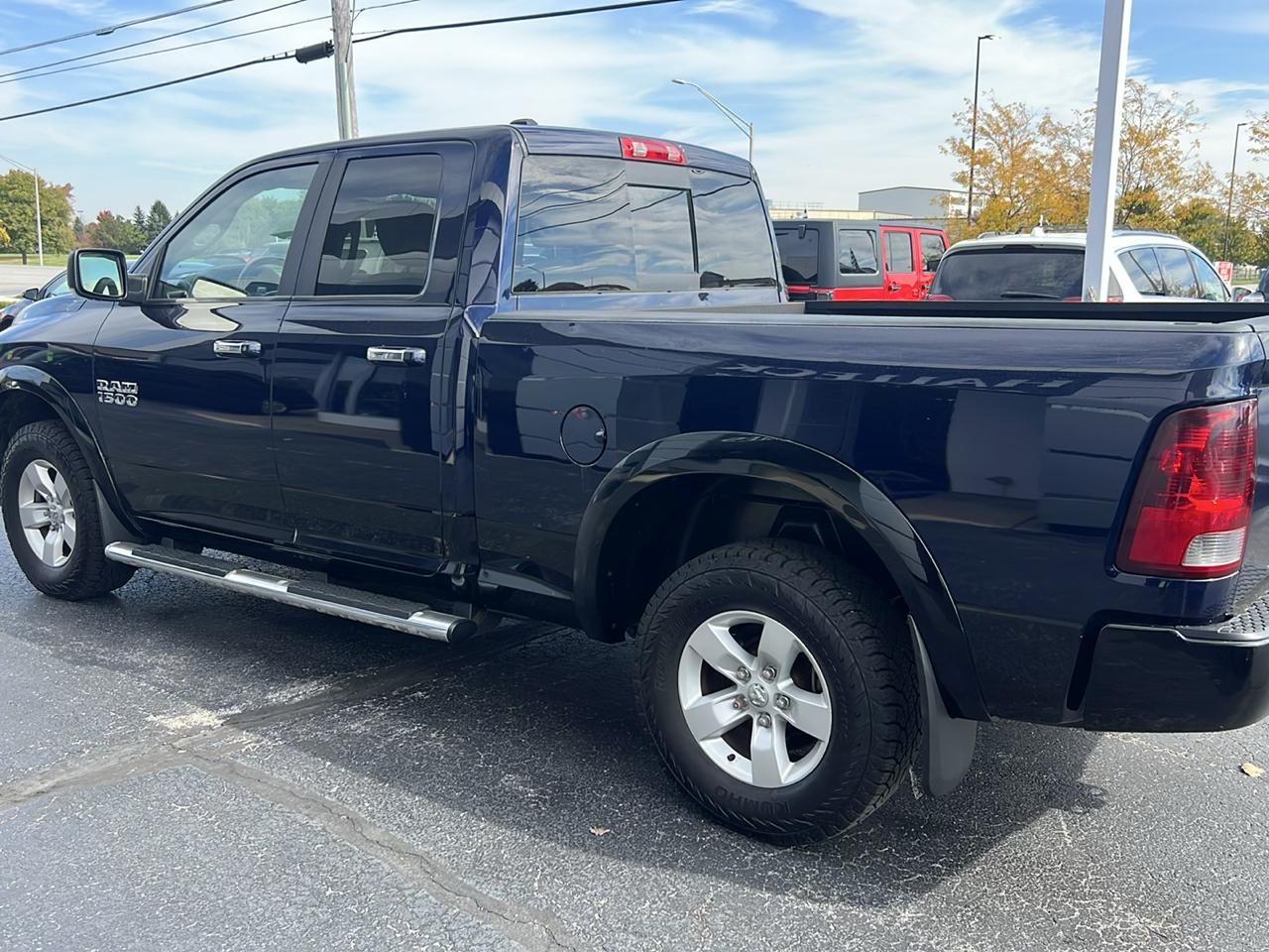 RAM 1500 4WD Quad Cab 140.5" Outdoorsman 2014