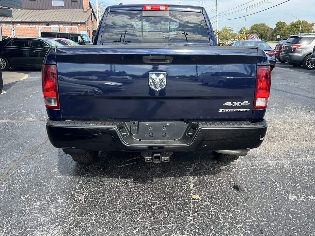 RAM 1500 4WD Quad Cab 140.5" Outdoorsman 2014