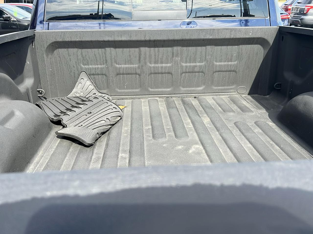 RAM 1500 4WD Quad Cab 140.5" Outdoorsman 2014