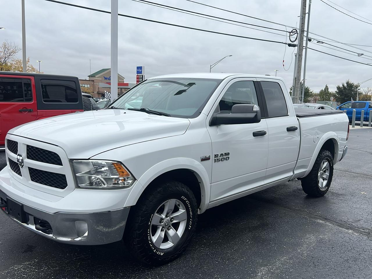RAM 1500 4WD Quad Cab 140.5" Outdoorsman 2015