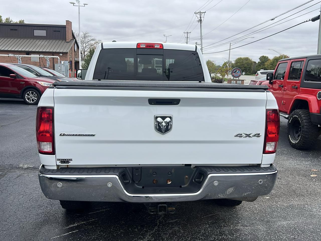 RAM 1500 4WD Quad Cab 140.5" Outdoorsman 2015