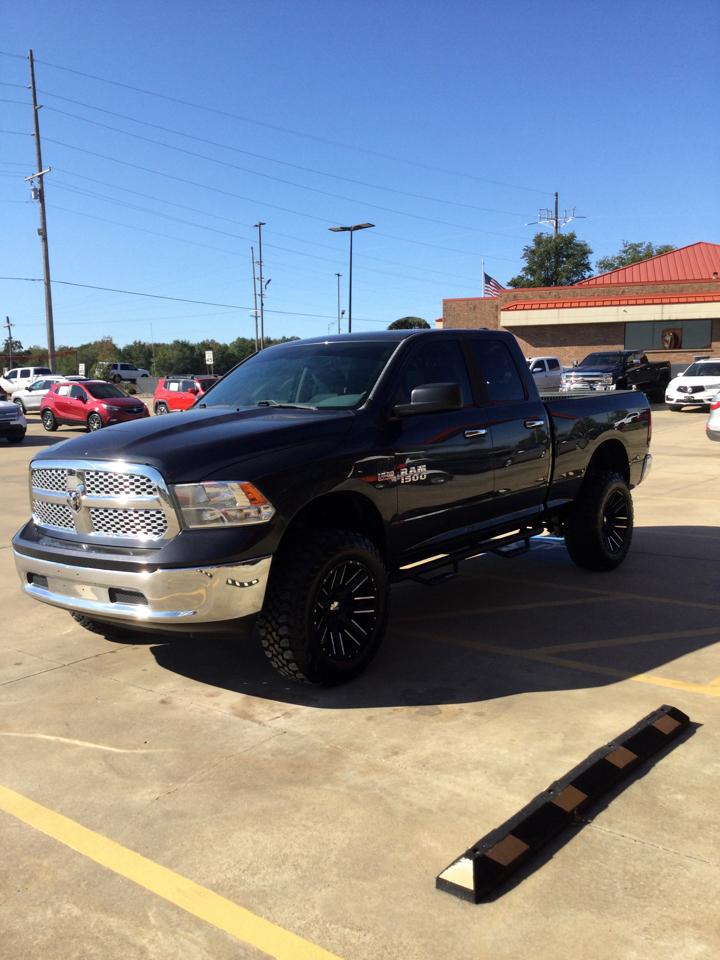 RAM 1500 4WD Quad Cab 140.5" SLT 2017