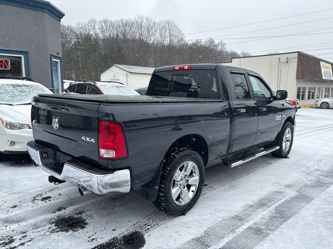 RAM 1500 4WD Quad Cab 140.5" Big Horn 2014