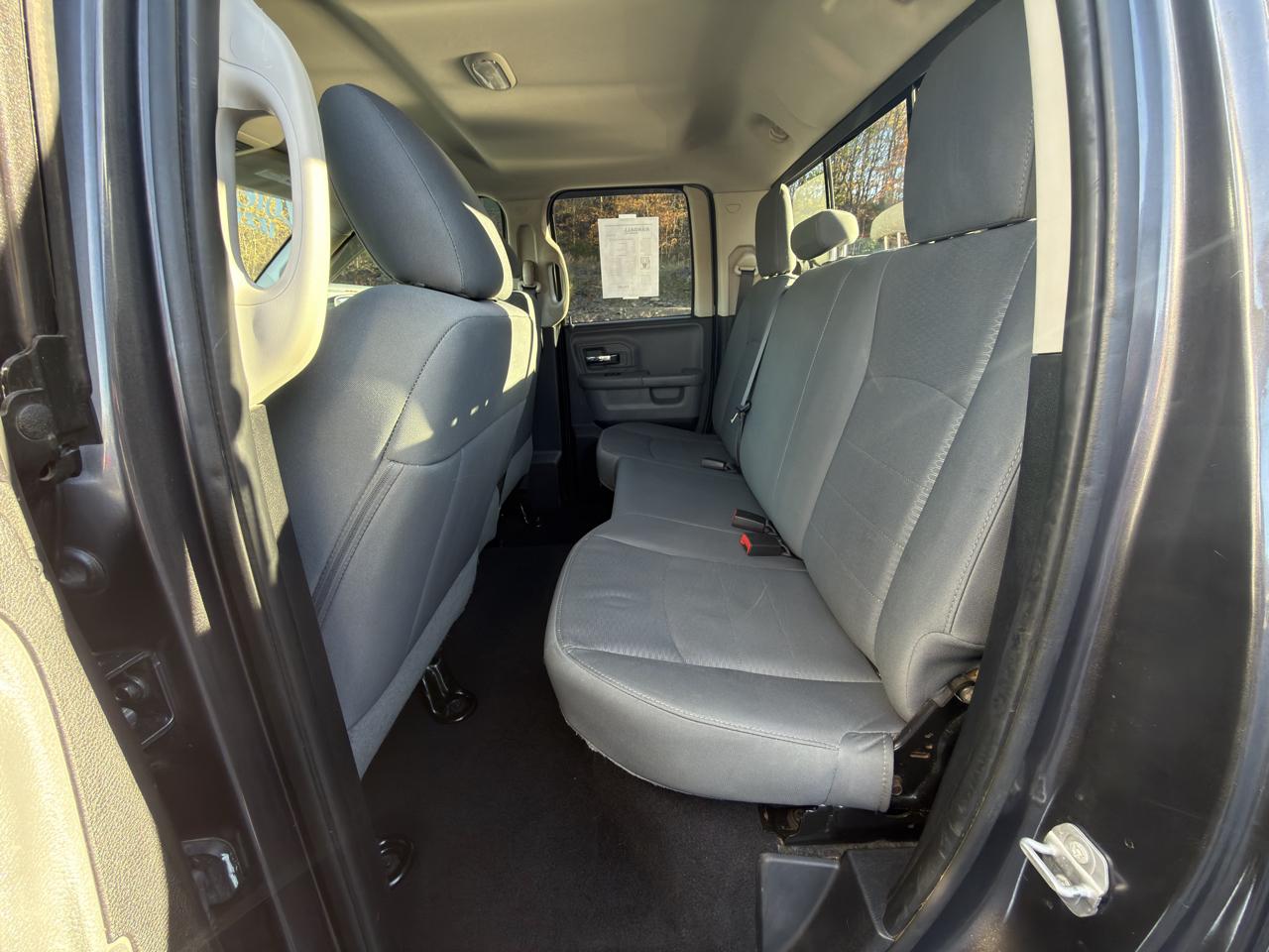RAM 1500 4WD Quad Cab 140.5" SLT 2016