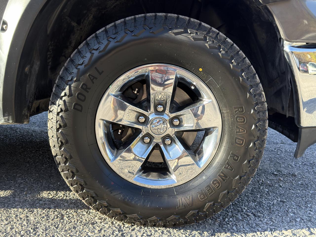 RAM 1500 4WD Quad Cab 140.5" SLT 2016