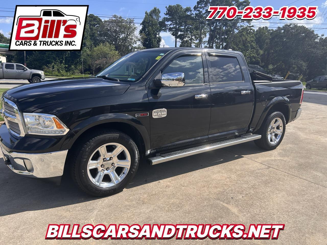 2015 RAM 1500 4WD Crew Cab 140.5" Laramie Longhorn