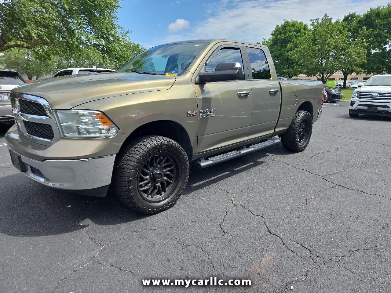 RAM 1500 4WD Quad Cab 140.5" SLT 2015