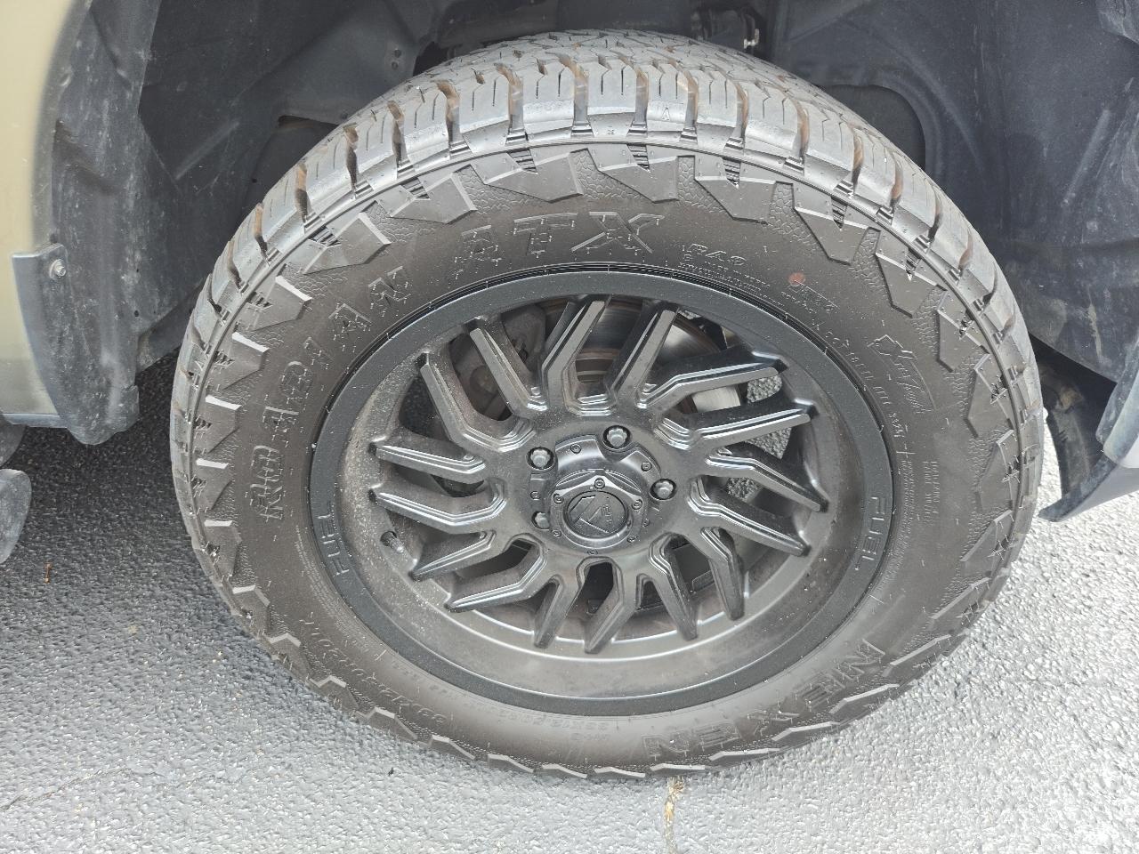 RAM 1500 4WD Quad Cab 140.5" SLT 2015
