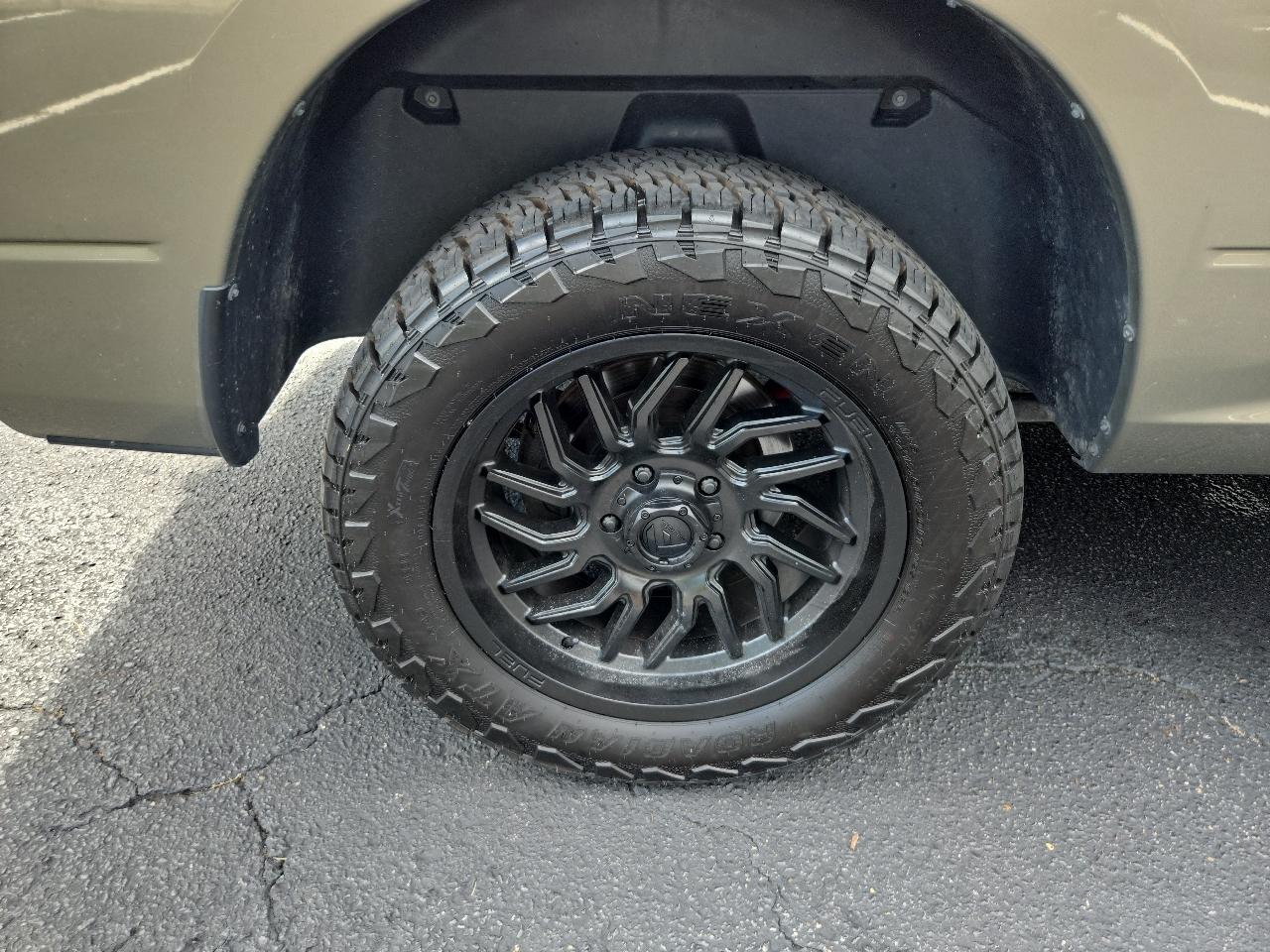 RAM 1500 4WD Quad Cab 140.5" SLT 2015