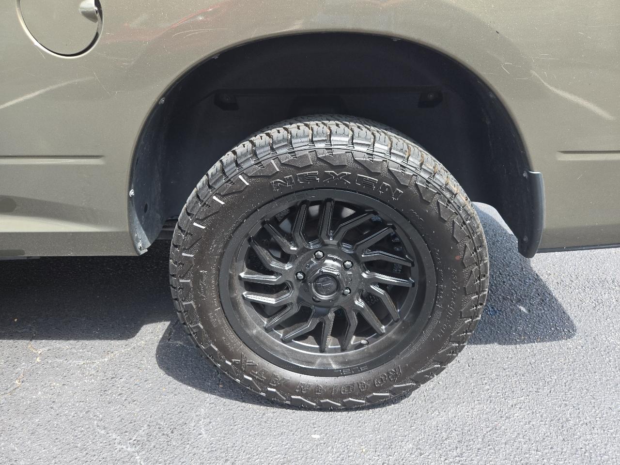 RAM 1500 4WD Quad Cab 140.5" SLT 2015