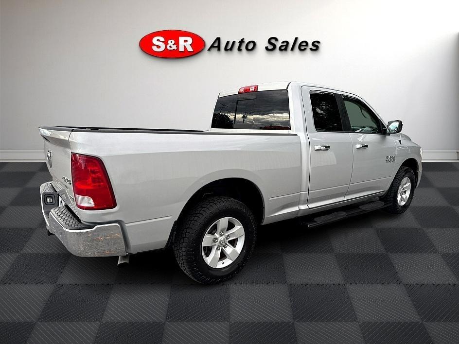 RAM 1500 4WD Quad Cab 140.5" SLT 2016