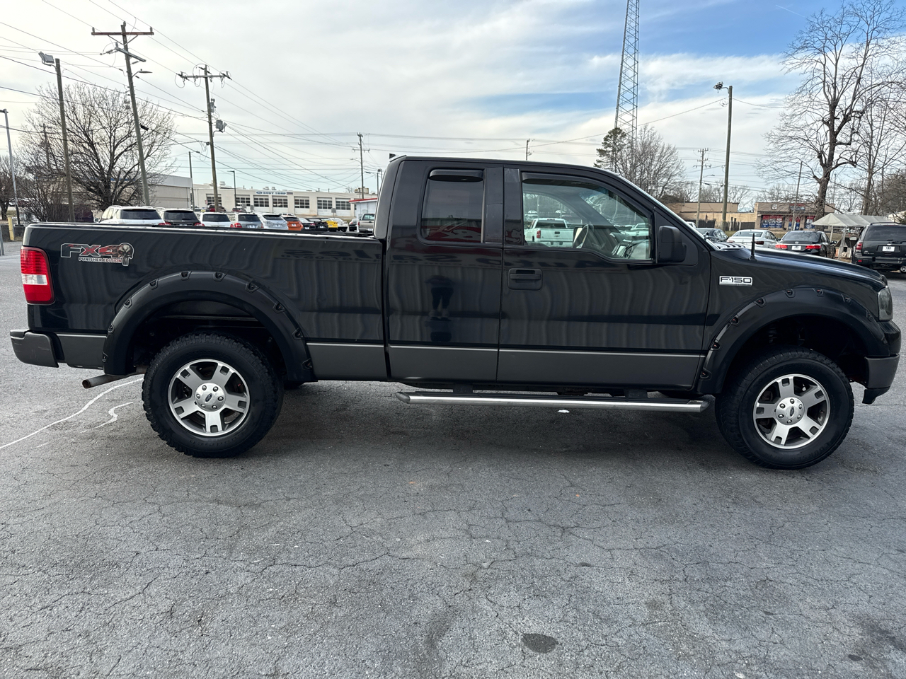 Ford F-150 Supercab 145" Lariat 4WD 2005