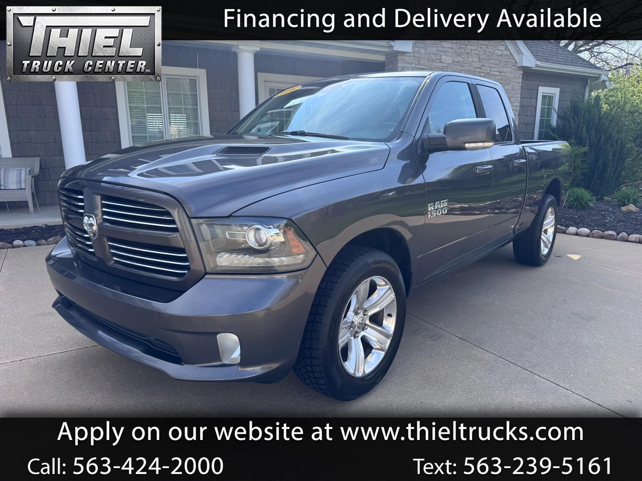 2016 RAM 1500 4WD Quad Cab 140.5" Sport