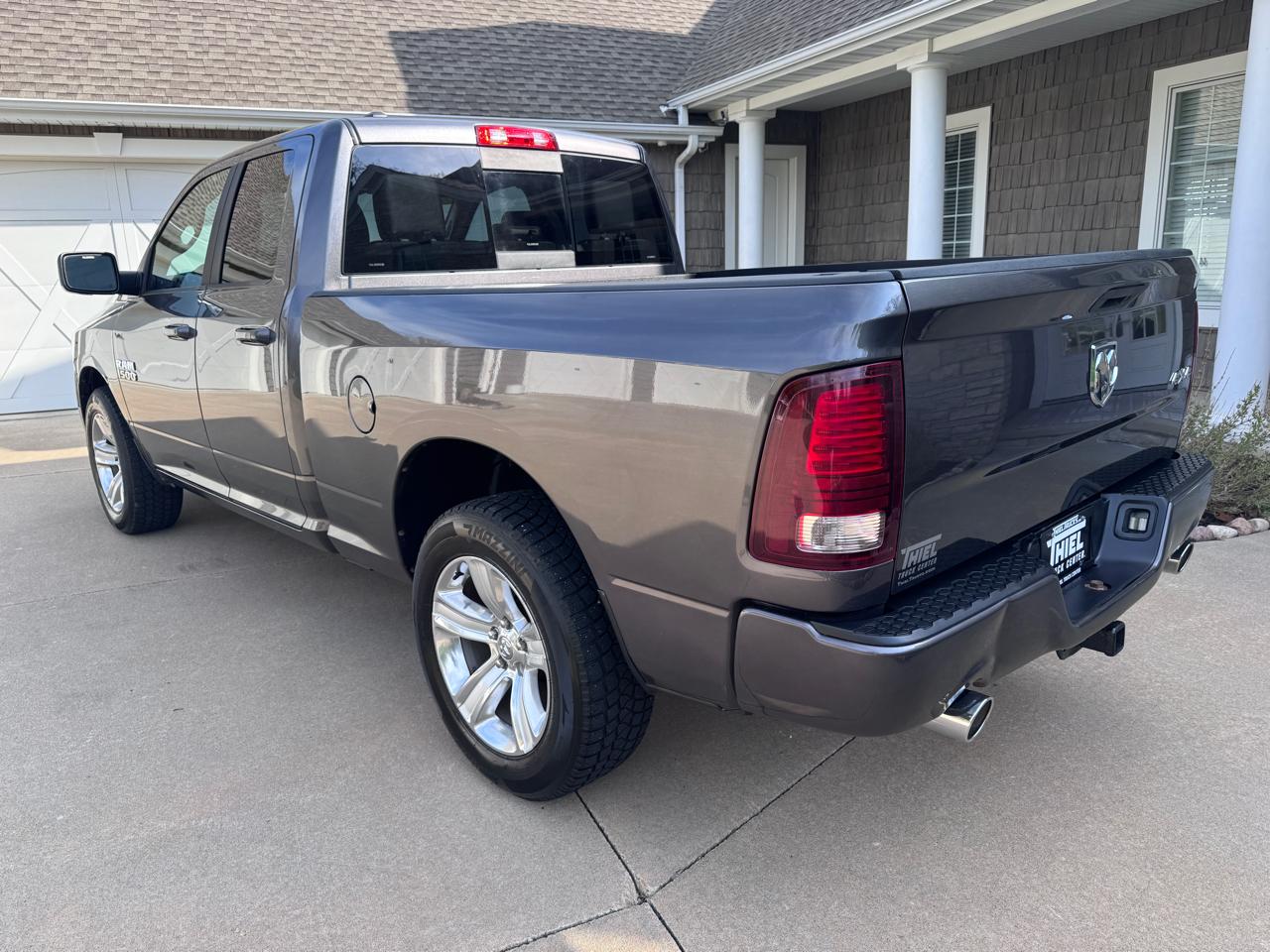 RAM 1500 4WD Quad Cab 140.5" Sport 2016