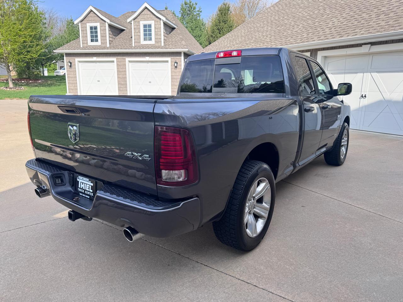 RAM 1500 4WD Quad Cab 140.5" Sport 2016