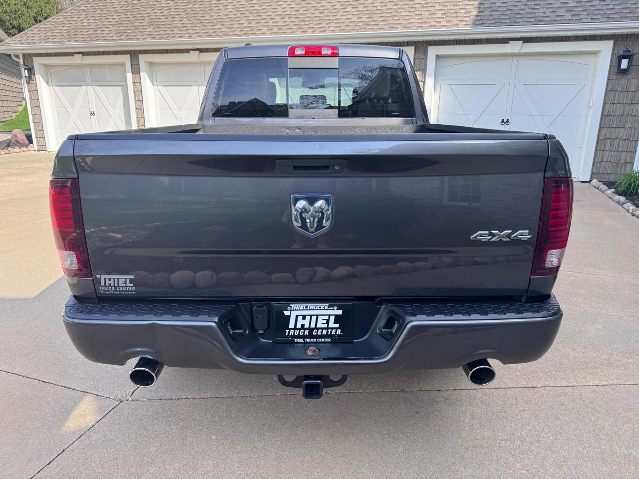 RAM 1500 4WD Quad Cab 140.5" Sport 2016