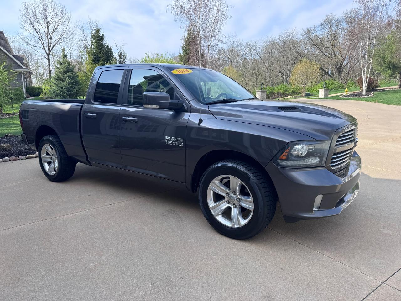 RAM 1500 4WD Quad Cab 140.5" Sport 2016