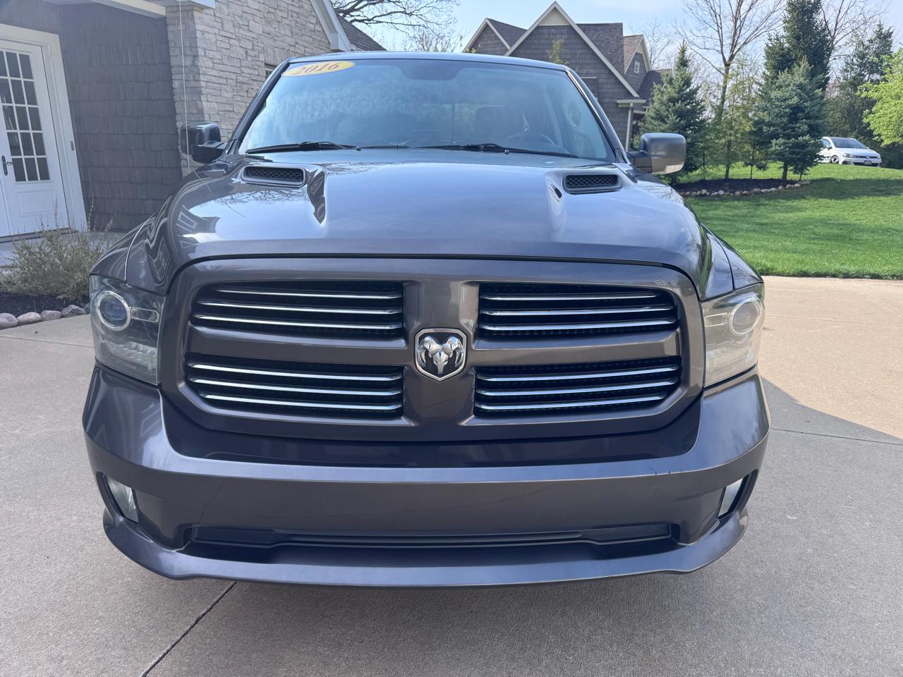 RAM 1500 4WD Quad Cab 140.5" Sport 2016