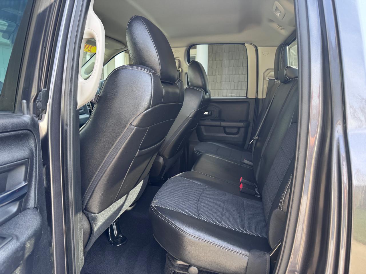 RAM 1500 4WD Quad Cab 140.5" Sport 2016