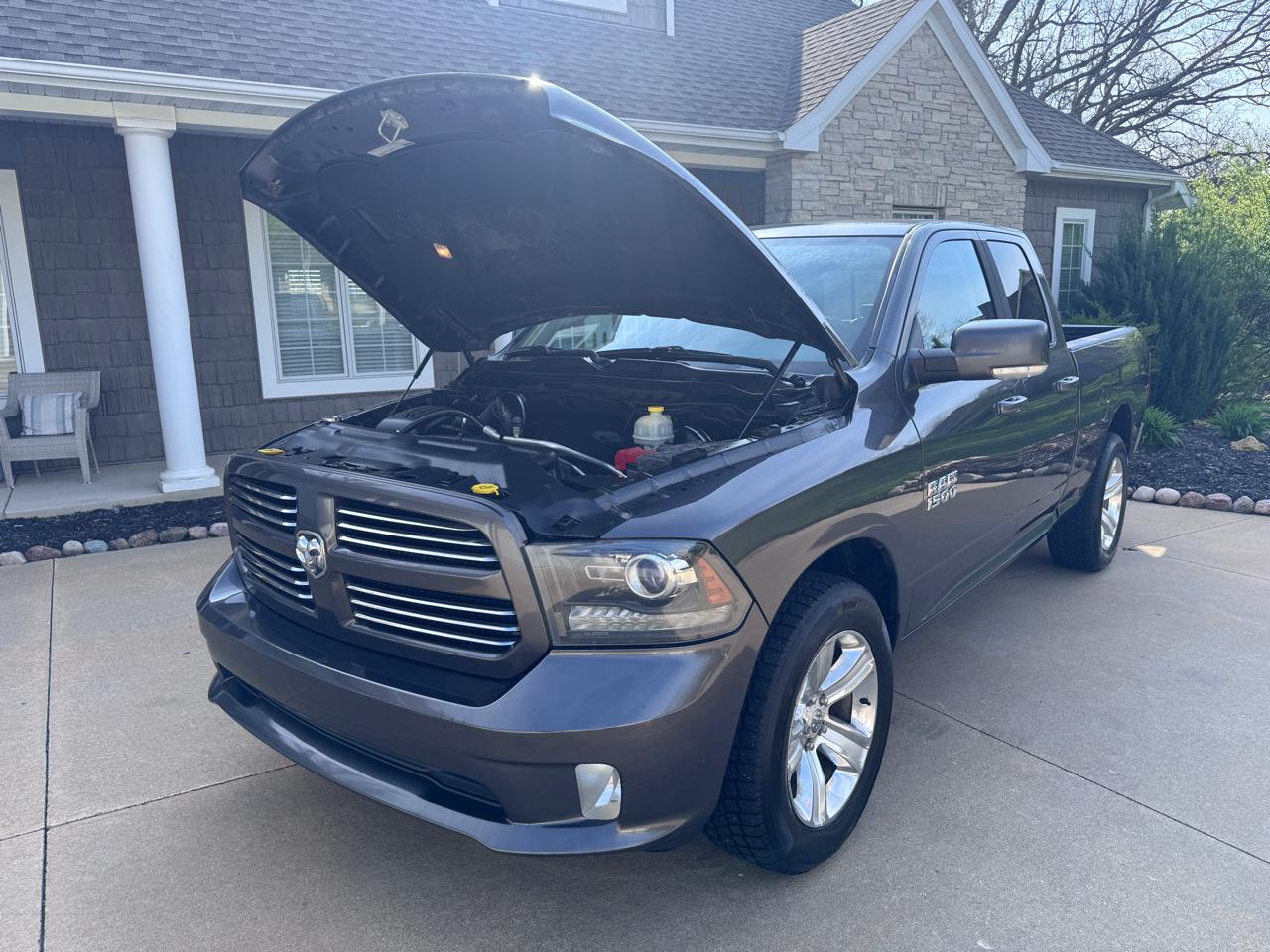 RAM 1500 4WD Quad Cab 140.5" Sport 2016