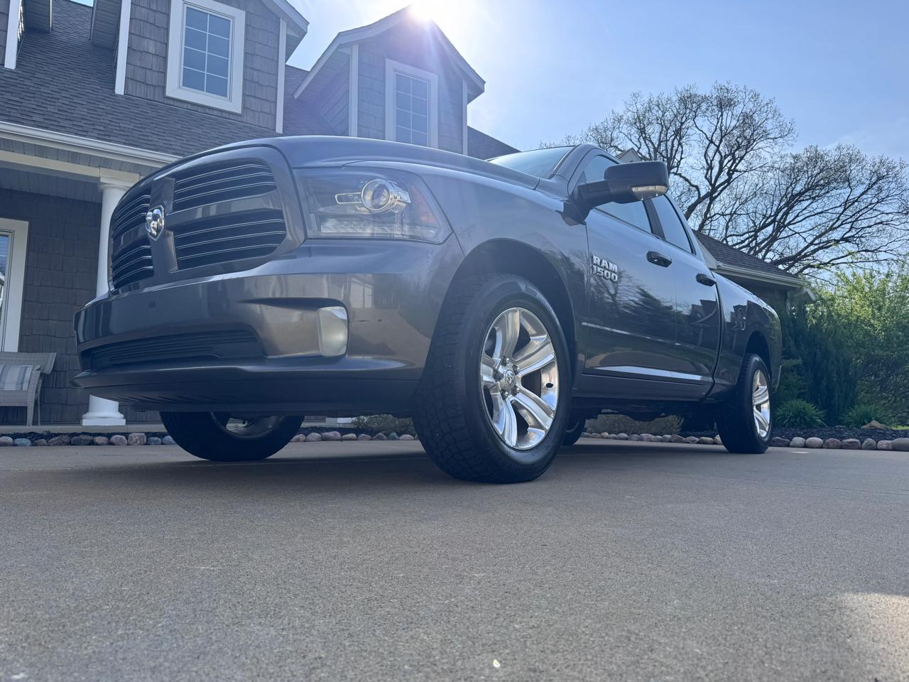 RAM 1500 4WD Quad Cab 140.5" Sport 2016