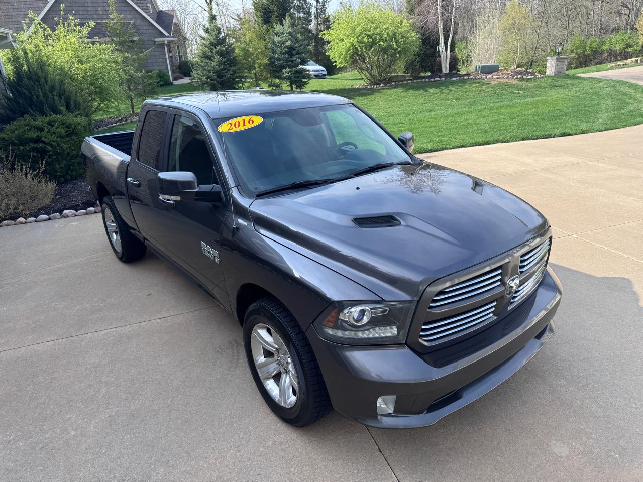 RAM 1500 4WD Quad Cab 140.5" Sport 2016