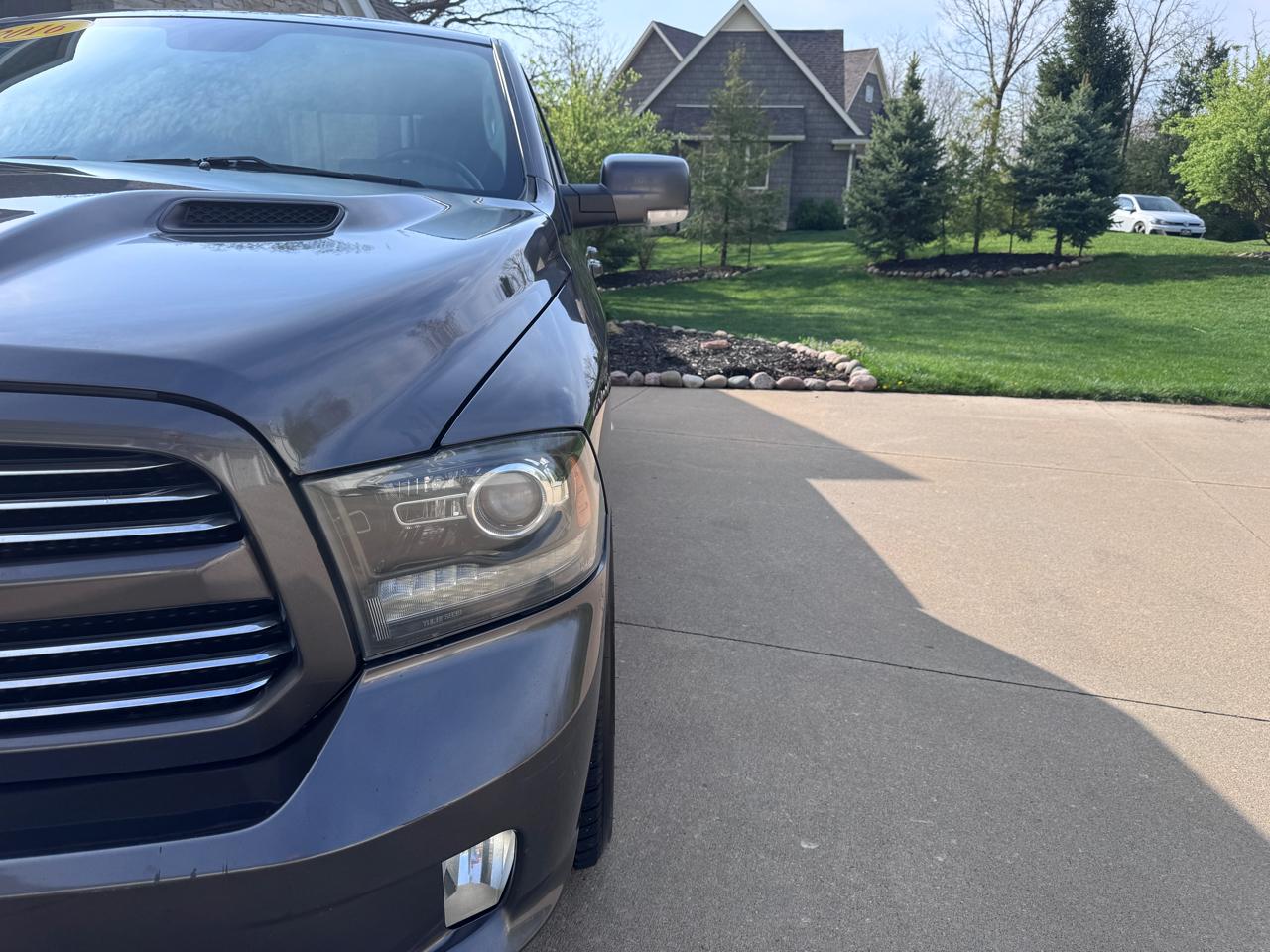 RAM 1500 4WD Quad Cab 140.5" Sport 2016