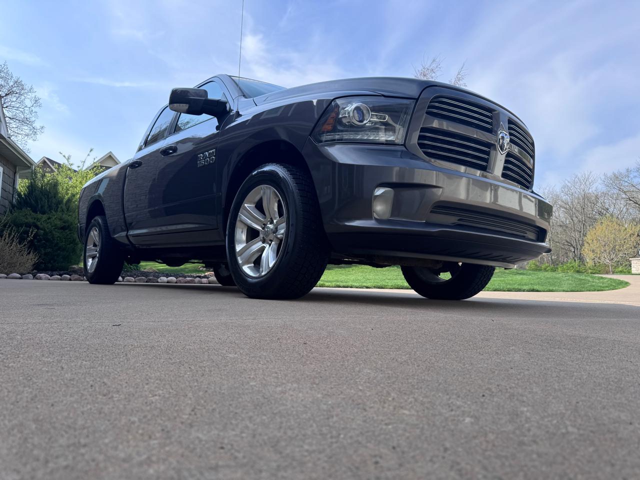 RAM 1500 4WD Quad Cab 140.5" Sport 2016