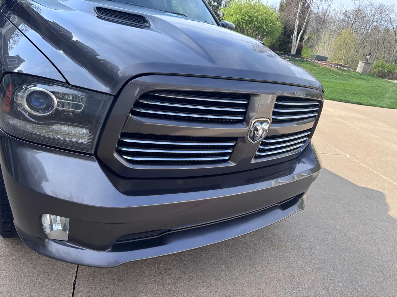 RAM 1500 4WD Quad Cab 140.5" Sport 2016