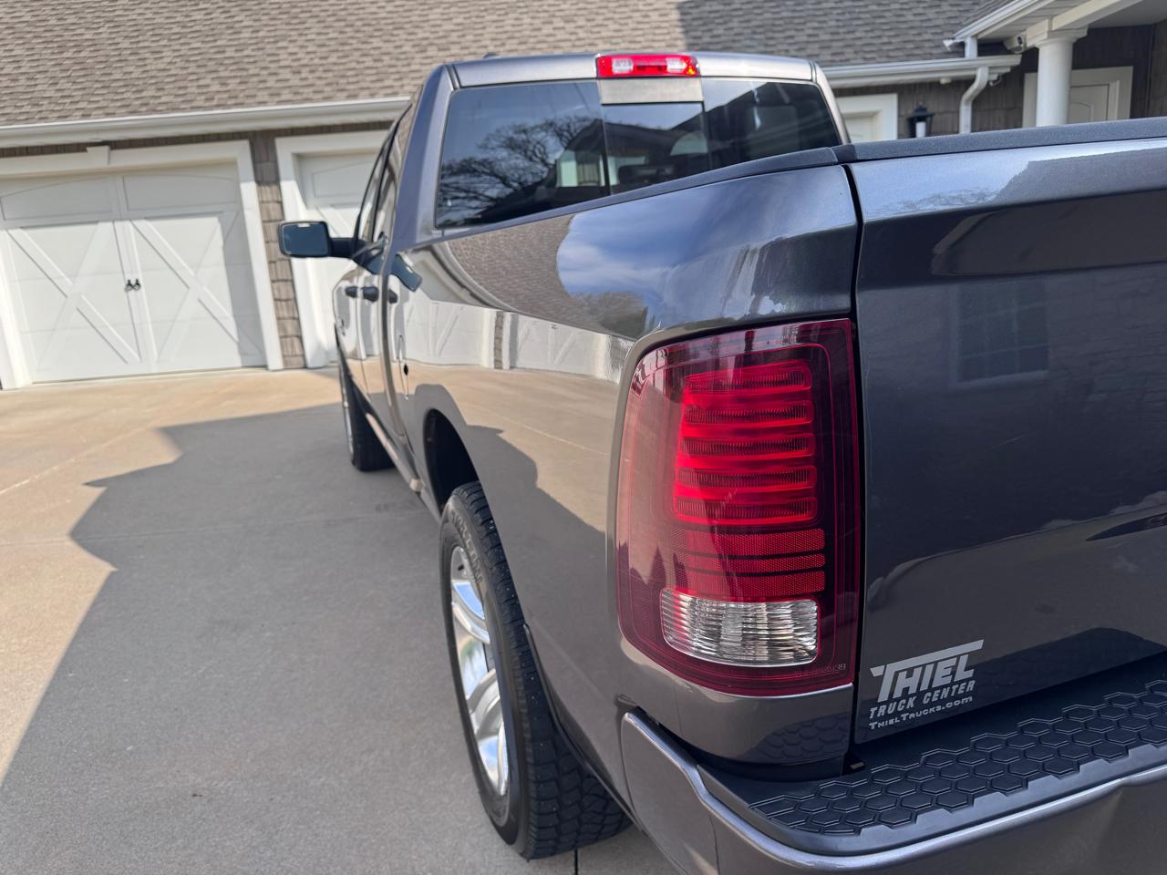 RAM 1500 4WD Quad Cab 140.5" Sport 2016