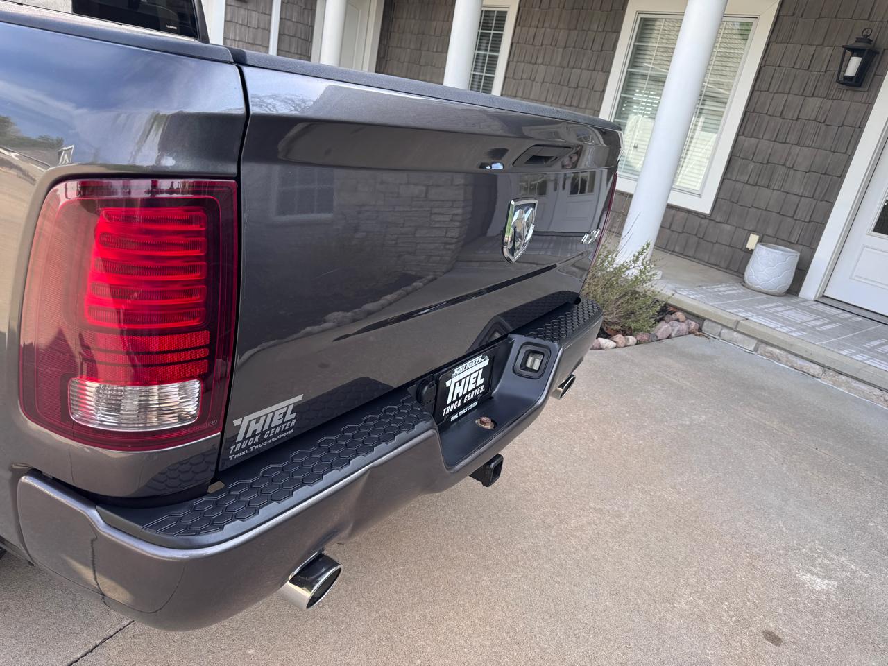 RAM 1500 4WD Quad Cab 140.5" Sport 2016