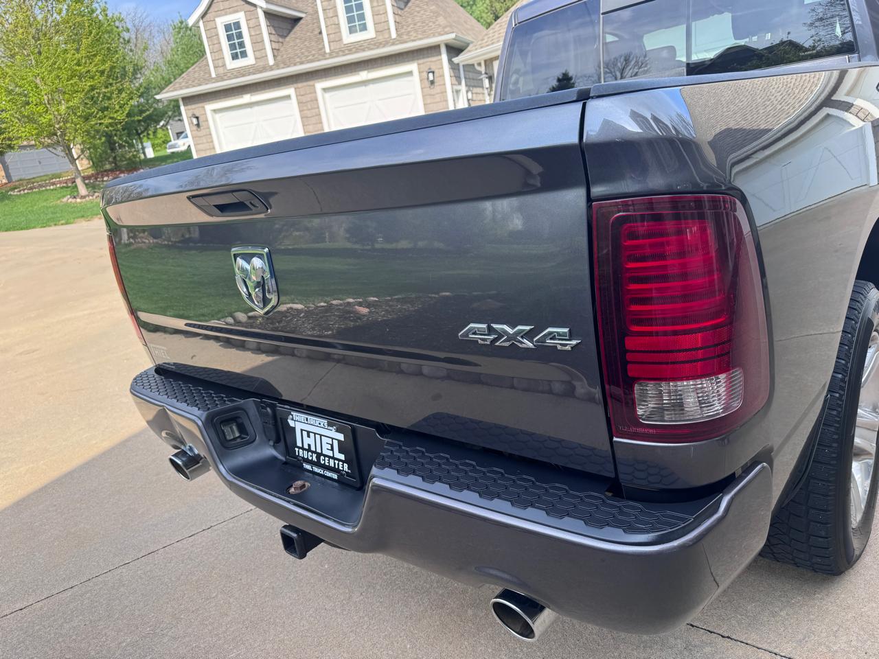 RAM 1500 4WD Quad Cab 140.5" Sport 2016