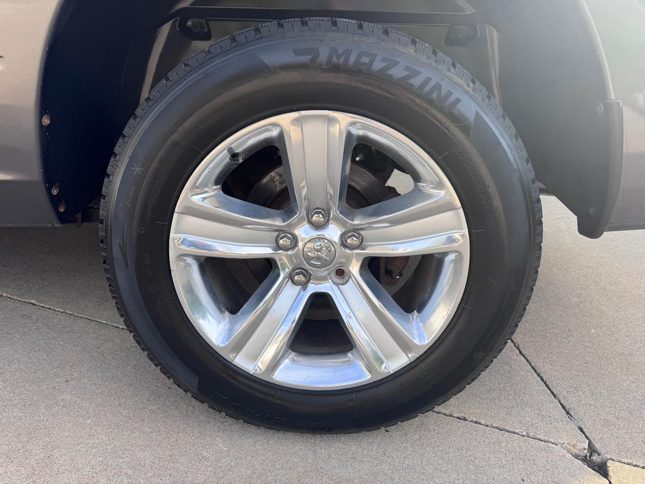 RAM 1500 4WD Quad Cab 140.5" Sport 2016