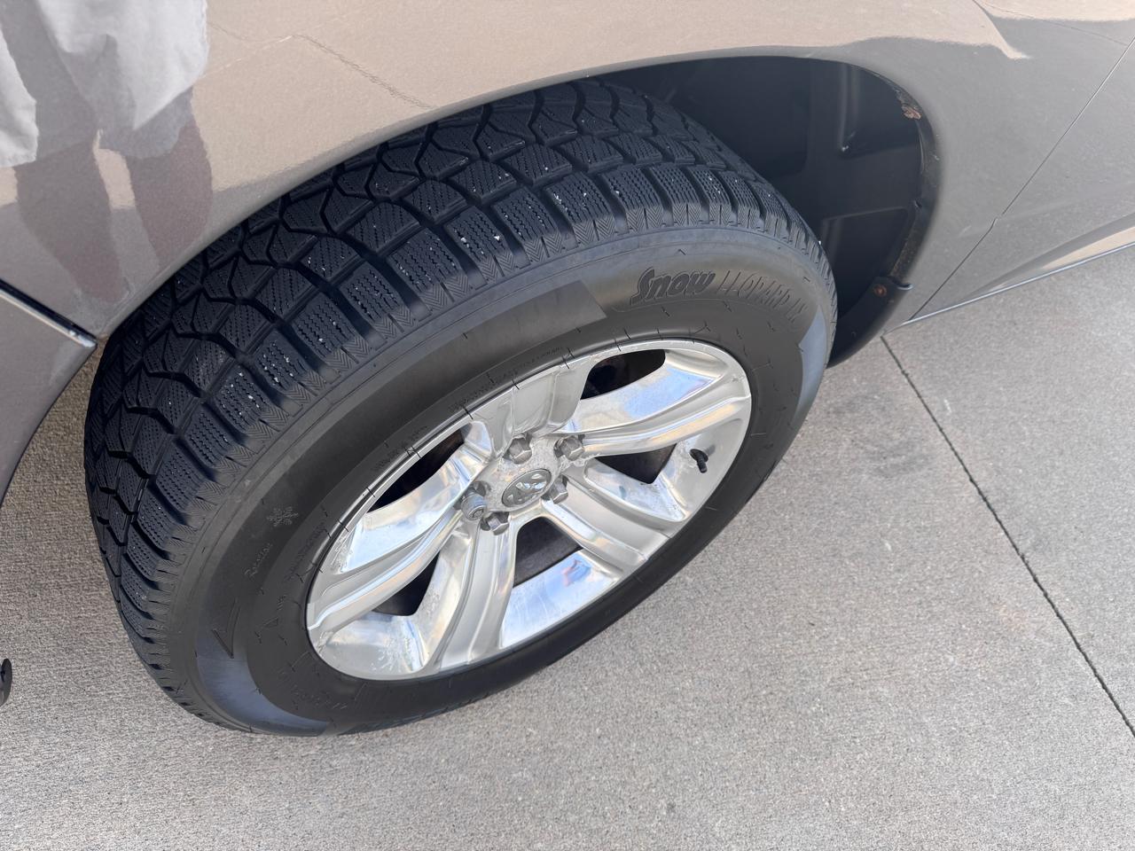 RAM 1500 4WD Quad Cab 140.5" Sport 2016