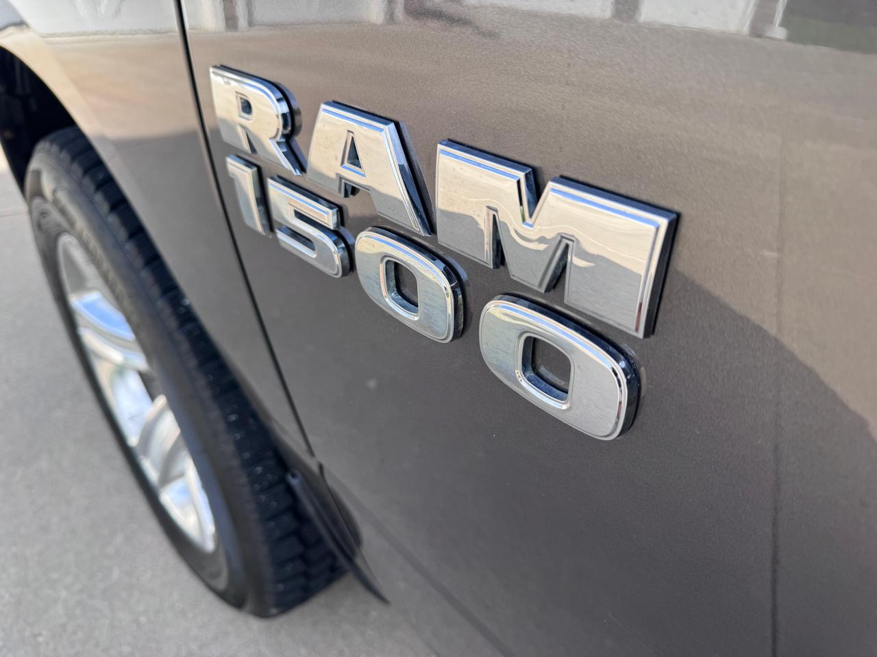 RAM 1500 4WD Quad Cab 140.5" Sport 2016