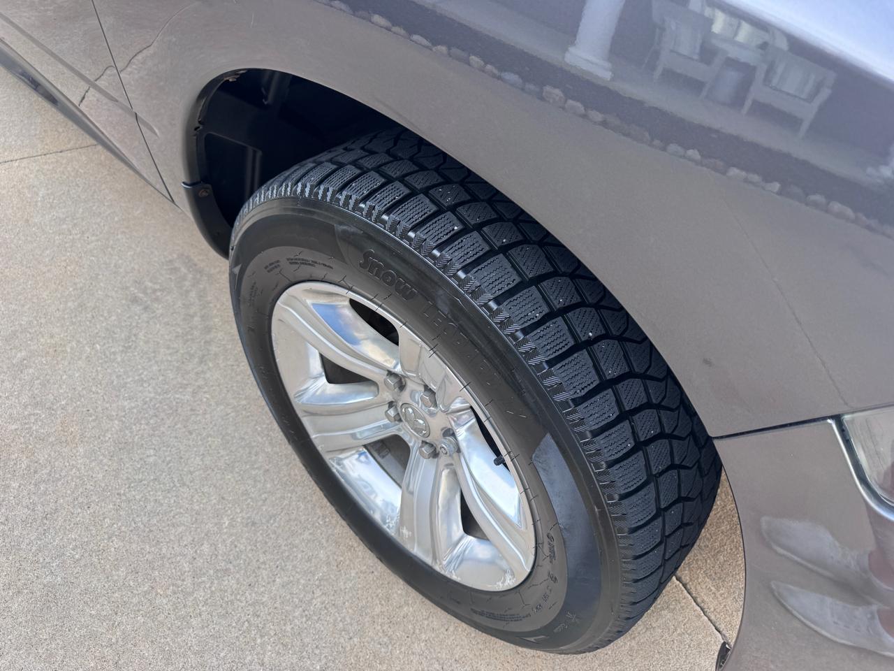 RAM 1500 4WD Quad Cab 140.5" Sport 2016