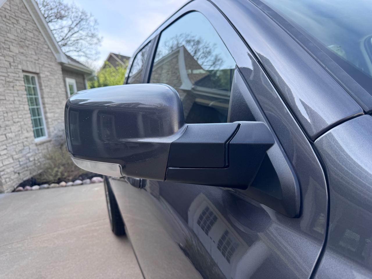 RAM 1500 4WD Quad Cab 140.5" Sport 2016