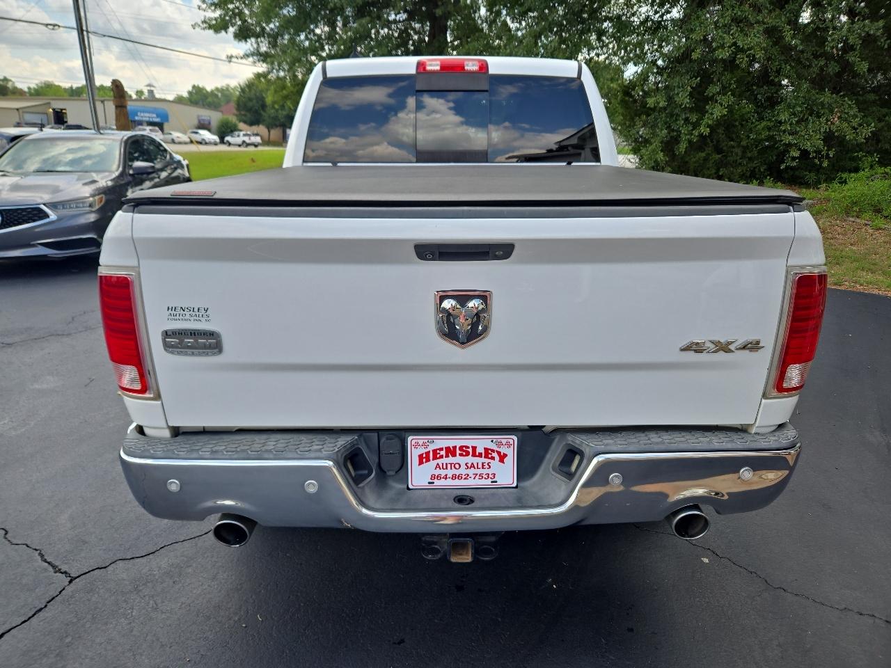 RAM 1500 4WD Crew Cab 149" Laramie Longhorn 2015