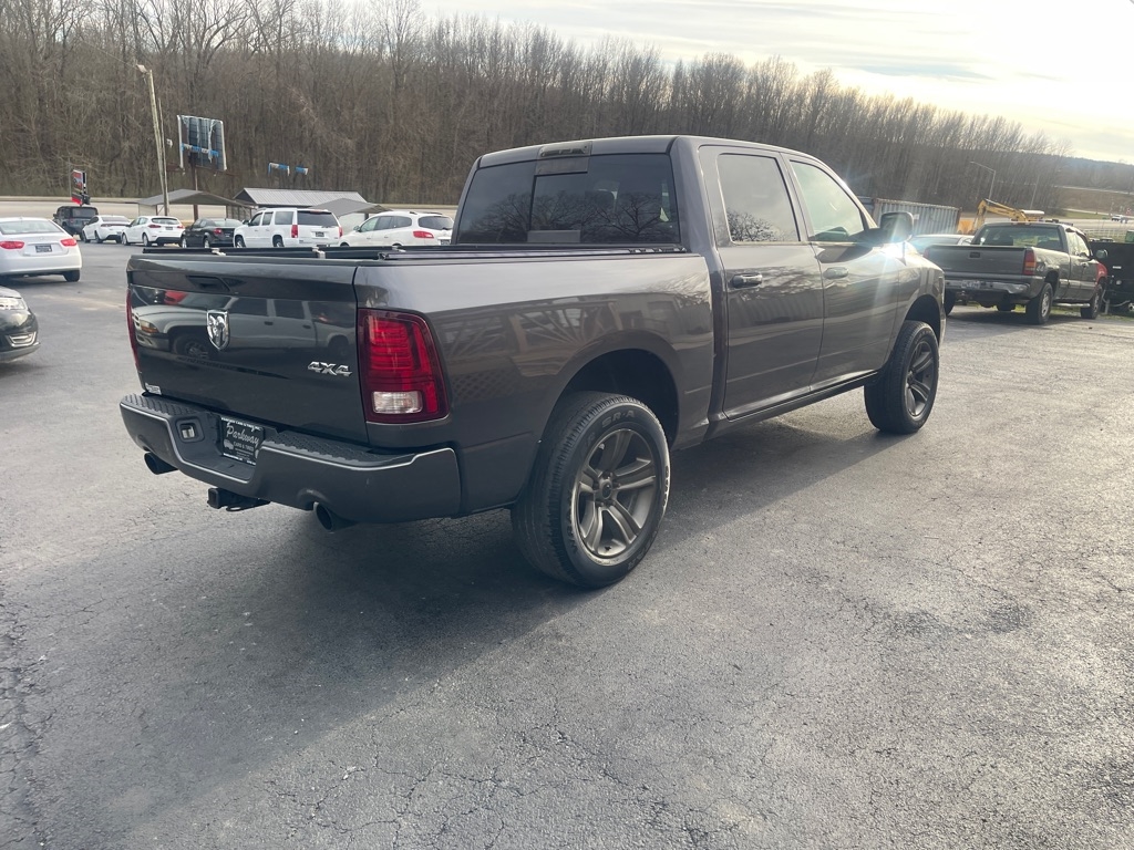 RAM 1500 4WD Crew Cab 140.5" Sport 2014