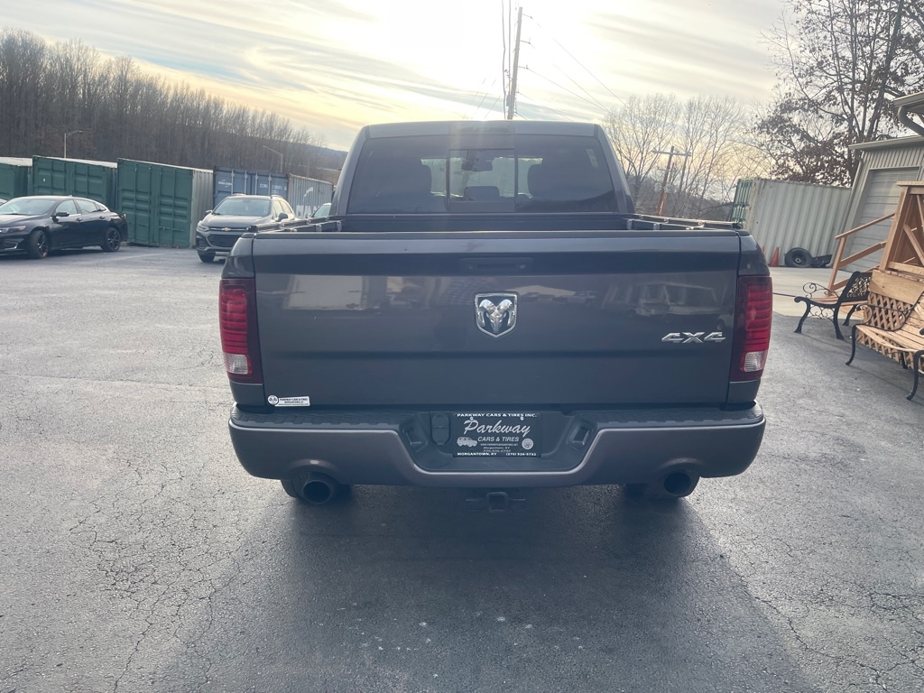RAM 1500 4WD Crew Cab 140.5" Sport 2014