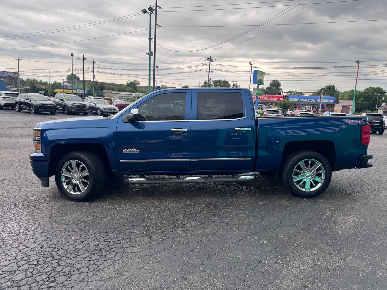 Chevrolet Silverado 1500 4WD Crew Cab 143.5" High Country 2015