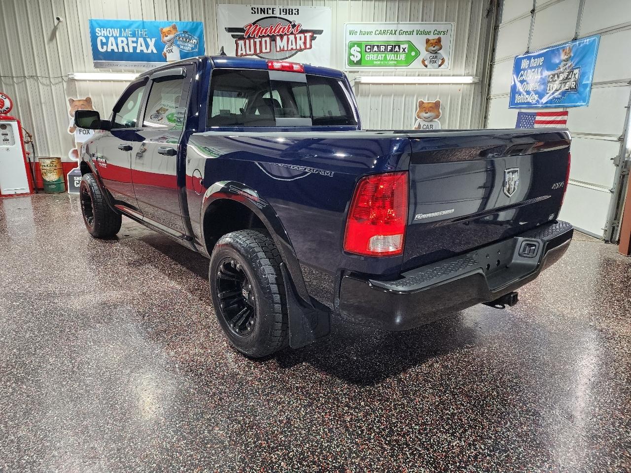 RAM 1500 4WD Crew Cab 140.5" Outdoorsman 2014