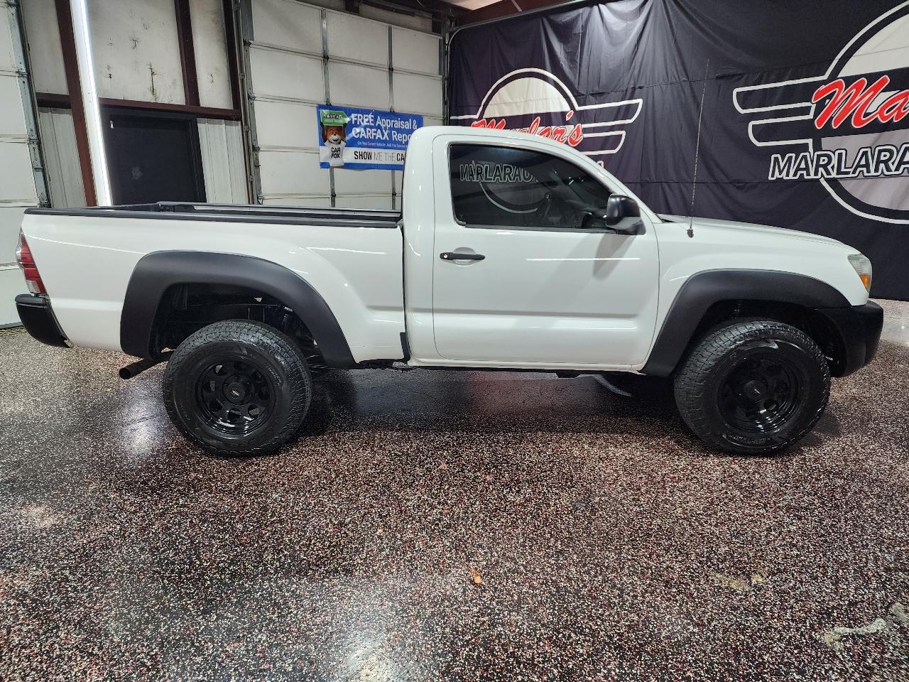 Toyota Tacoma 4WD Reg I4 MT (Natl) 2011